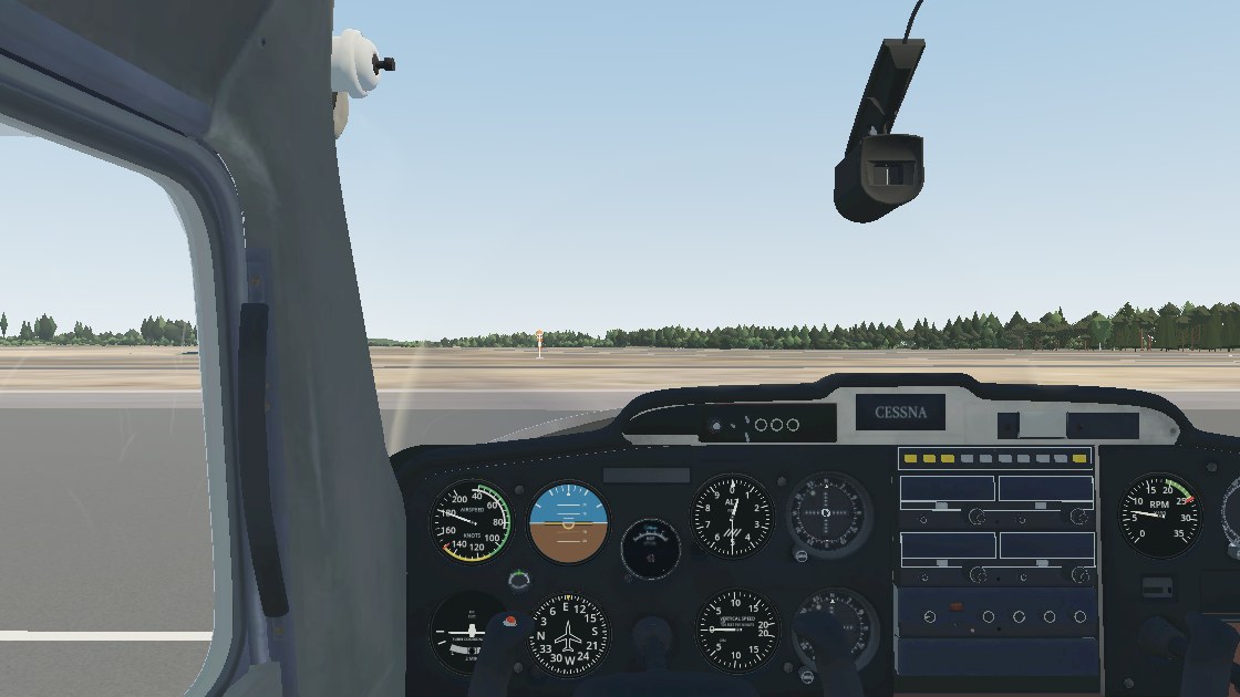 C152 cockpit parked on the apron at Vesivehmaa